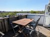 Balkon mit Blick über die Dünen, dem alten Wasserturm bis nach Borkum Stadt